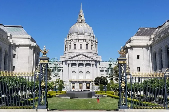 San Francisco City Hall with its dome behind ornate gates